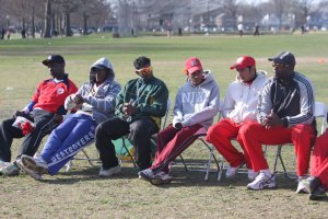 Americas Cricket Academy look on at presentation ceremony