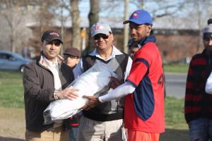 Alex Amsterdam receives his prize for man of the match in the semifinal