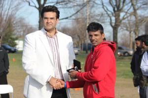 Prashant Nair receives his medal, he had a tournament high 8 wickets