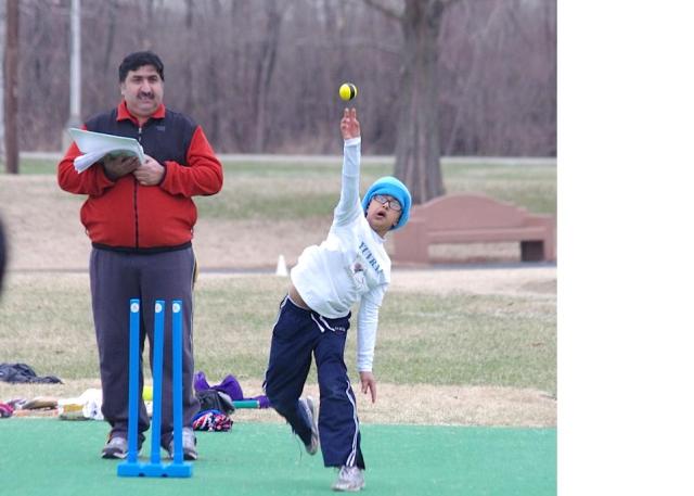 Youth Cricket bowls during the MYCA's National Youth Cricket Day