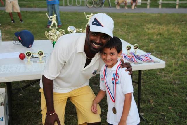 CLPUSA Parent presented a medal to a "Pee-Wee Cricketer"